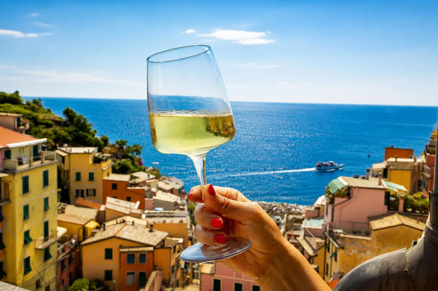 Glass of wine overlooking the sea in Riomaggiore